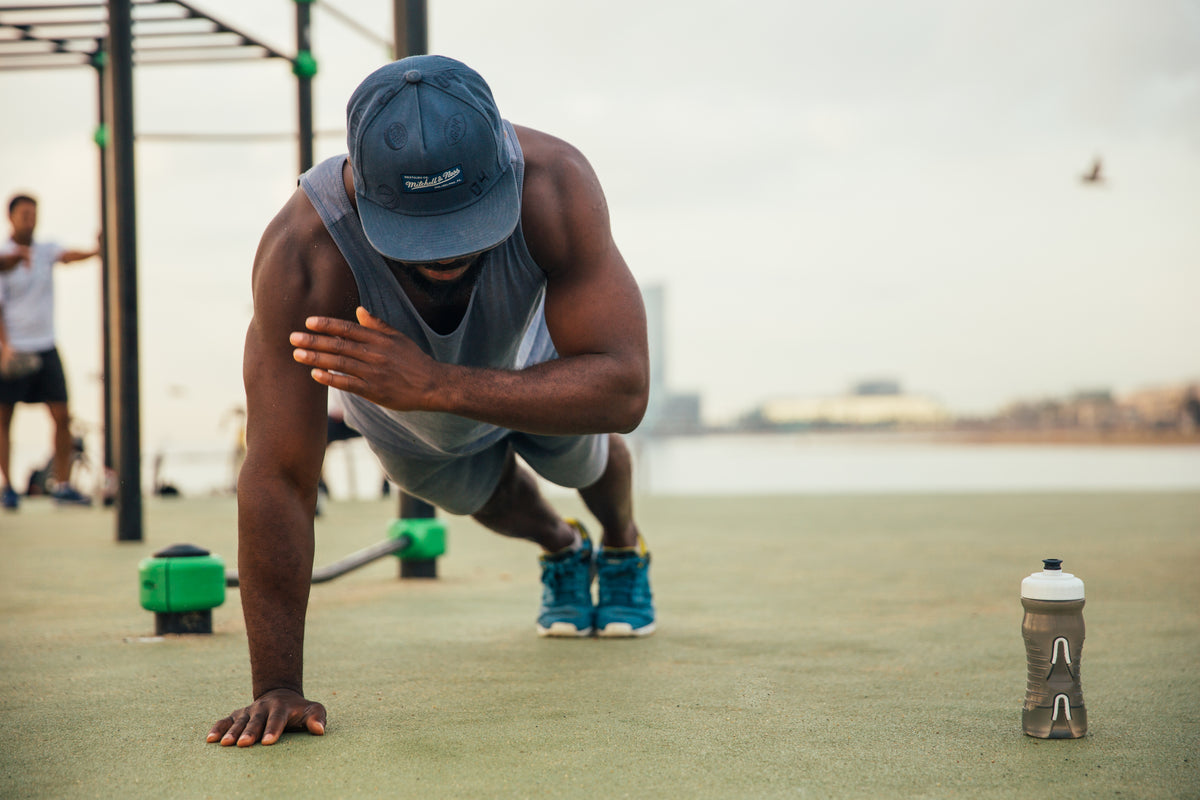 STRYK fitness apparel - soldier-style push-ups for raw strength.